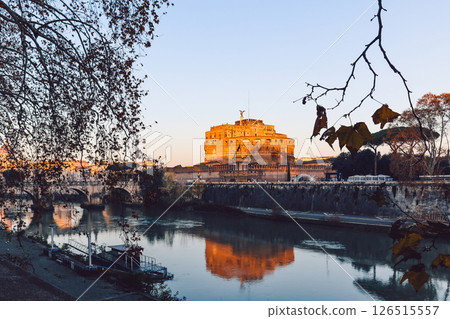 Rome in morning. Panoramic view of Castel Sant'Angelo with reflection in Tiber river in Rome, Italy. 126515557