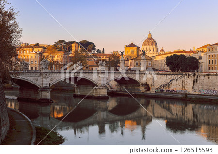 Rome in morning. Panoramic view of Castel Sant'Angelo and Bridge in Rome with reflection in Tiber river. 126515593