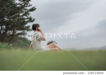 A man working remotely at a resort A man working remotely at a resort 126515644
