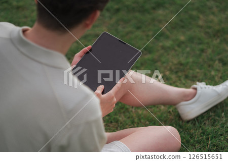 A man working remotely at a resort 126515651