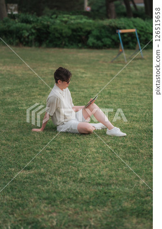A man working remotely at a resort A man working remotely at a resort 126515658