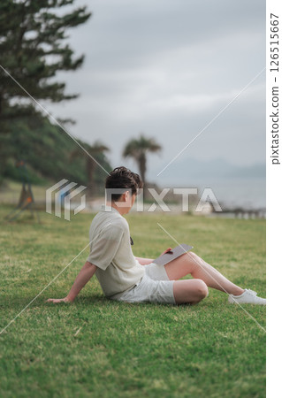 A man working remotely at a resort A man working remotely at a resort 126515667