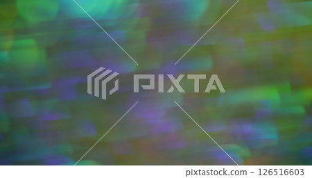 Defocused glow color. Crystal light. Multicolored green blue purple texture radiant lens flare on blurred abstract optical background. Defocused glow color. Crystal light. Multicolored green blue purple texture radiant lens flare on blurred abstract optical background. 126516603