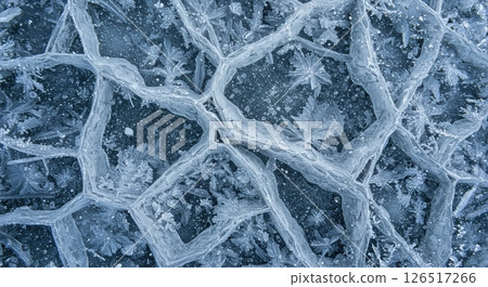 Natural ice patterns with intricate crystalline structures and a cold, frosty texture 126517266