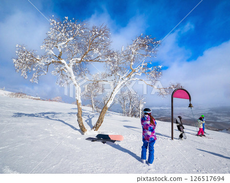 Ski resort bells and snow-covered trees (Niseko, Hokkaido) Ski resort bells and snow-covered trees (Niseko, Hokkaido) 126517694