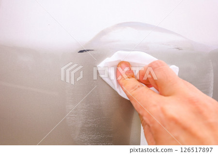Bumper being repaired with compound Bumper being repaired with compound 126517897