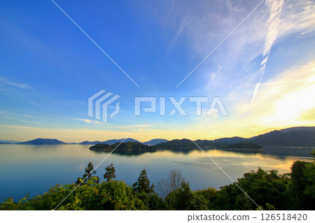 View of the Tobishima Kaido from Oshiba Island at dusk 126518420