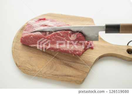 Cut beef into chunks Cut beef into chunks 126519080