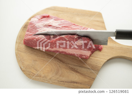 Cut beef into chunks Cut beef into chunks 126519081