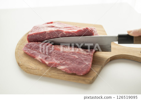 Cut beef into chunks Cut beef into chunks 126519095