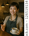 cafe clerk with coffee 126519134