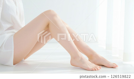 Hair removal image of a beautiful white-skinned woman bending her healthy legs 126519822