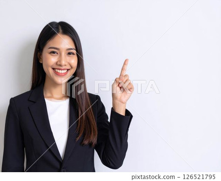 A woman pointing up 126521795