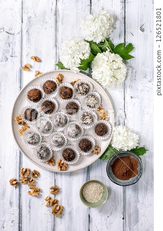 Homemade raw vegan balls Truffles With White Flowers 126521801