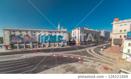 Road marking on the road repair site after asphalting timelapse. Road construction equipment. 126521889