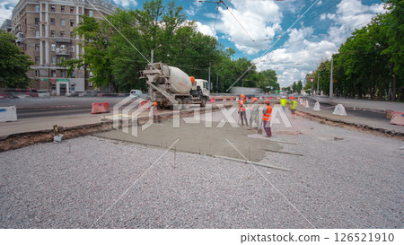 Road construction site with tram tracks repair and maintenance timelapse. Road construction site with tram tracks repair and maintenance timelapse. 126521910