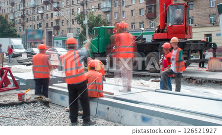 Road construction site with tram tracks repair and maintenance timelapse. 126521927