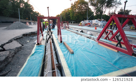 Road construction site with tram tracks repair and maintenance timelapse hyperlapse. Road construction site with tram tracks repair and maintenance timelapse hyperlapse. 126521928