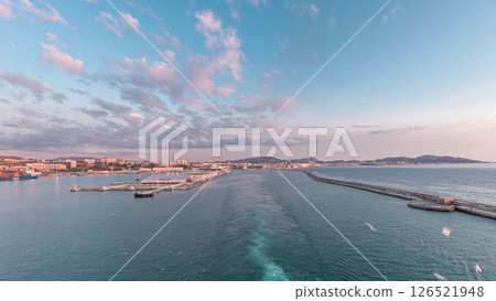 Aerial view of sea with waves and port from ship sailing in the open sea timelapse 126521948
