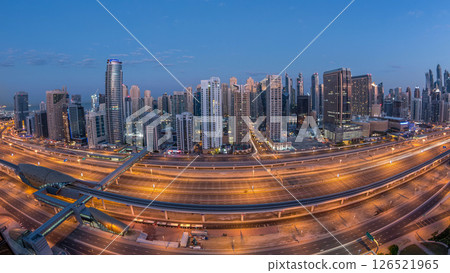 Dubai Marina skyscrapers aerial top view before sunrise from JLT in Dubai night to day timelapse, UAE. Dubai Marina skyscrapers aerial top view before sunrise from JLT in Dubai night to day timelapse, UAE. 126521965