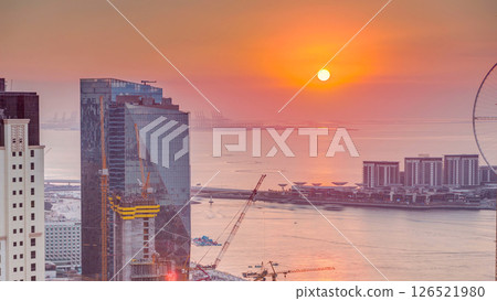 JBR and Bluewaters island at sunset aerial timelapse 126521980