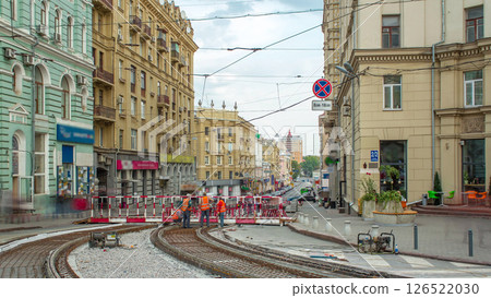 Workers with protective mask welding reinforcement for tram tracks in the city timelapse 126522030