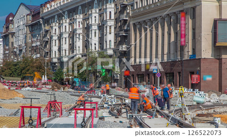 Tram rails at the stage of their installation and integration into concrete plates on the road timelapse Tram rails at the stage of their installation and integration into concrete plates on the road timelapse 126522073