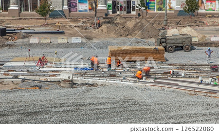 Repair works on the street timelapse. Laying of new tram rails on a city street 126522080