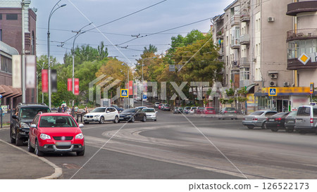 Traffic on intersection of Trinkler and Mayakovsky street near Sumskoy market, Kharkov city timelapse 126522173