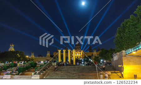 Famous light show and magic fountains timelapse hyperlapse in front of the National Art Museum at Placa Espanya in Barcelona at night, Catalonia, Spain 126522234