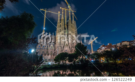 Sagrada Familia, a large church in Barcelona, Spain day to night timelapse. 126522249