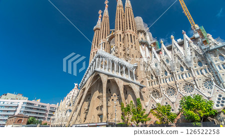 Sagrada Familia, a large Roman Catholic church in Barcelona, Spain timelapse hyperlapse 126522258