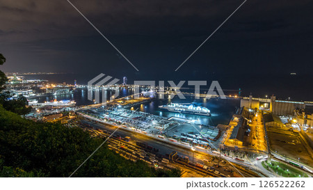 Night skyline from Montjuic with Port Vell timelapse, Barcelona, Catalonia, Spain Night skyline from Montjuic with Port Vell timelapse, Barcelona, Catalonia, Spain 126522262