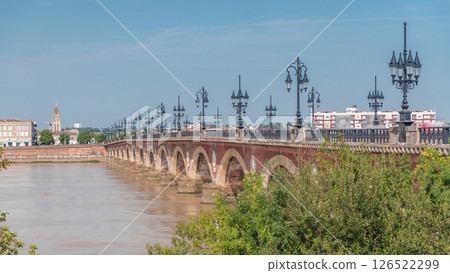 Pont de Pierre timelapse, the historic Stone Bridge in Bordeaux, spans the Garonne River 126522299