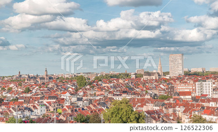 Aerial timelapse panorama over Brussels skyline in Schaerbeek with Saint-Servais Church and Town Hall Aerial timelapse panorama over Brussels skyline in Schaerbeek with Saint-Servais Church and Town Hall 126522306