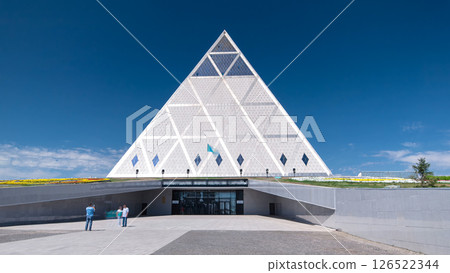 Exterior of the Palace of Peace and Reconciliation building timelapse hyperlapse in Astana, Kazakhstan. 126522344