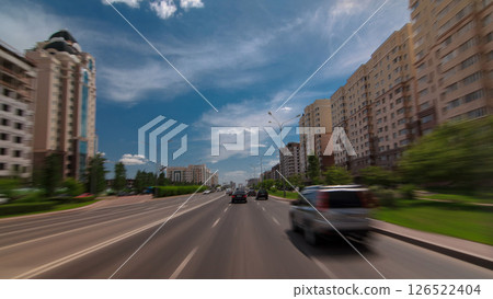 Car drives on street Traffic over the wide boulevards of Astana timelapse hyperlapse drivelapse in Kazakhstan Car drives on street Traffic over the wide boulevards of Astana timelapse hyperlapse drivelapse in Kazakhstan 126522404