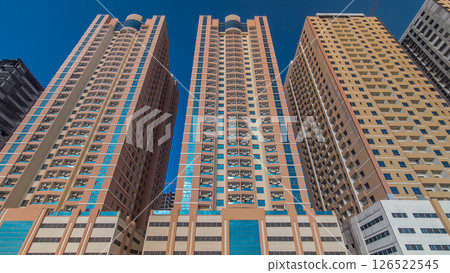 Modern new towers in Ajman timelapse hyperlapse. Cityscape of Ajman. Modern new towers in Ajman timelapse hyperlapse. Cityscape of Ajman. 126522545