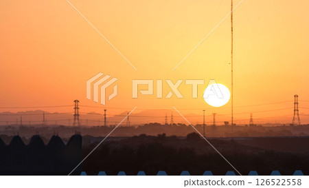 Sunset in Ajman from rooftop timelapse. Ajman is the capital of the emirate of Ajman in the United Arab Emirates. 126522558