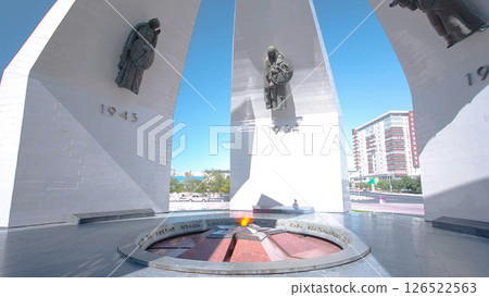 Stela with portraits of Mangistau heroes of the Great Patriotic War at the Eternal Flame timelapse hyperlapse 126522563