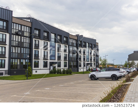 Shot of the stylish, modern, urban, residential suburb where buildings have ergonomic design and vivid colors 126523724