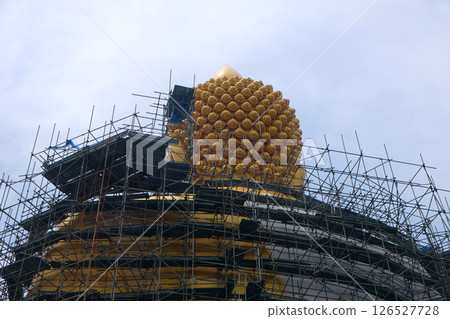 Construction And Repair Work Big Buddha Figure Construction And Repair Work Big Buddha Figure 126527728