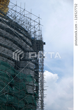 Construction And Repair Work Big Buddha Figure 126527732