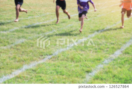 Blurred photo of kid running in school sport day for learning activity in school Blurred photo of kid running in school sport day for learning activity in school 126527864