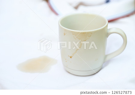 dirty coffee stain on cup from drinking in freetime. stain for cleaning concept 126527873