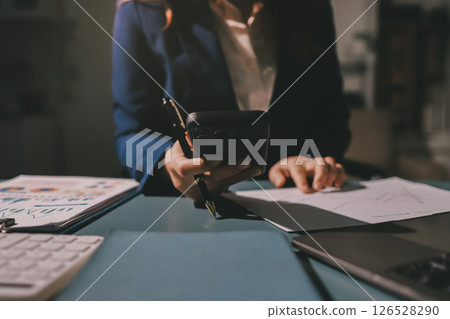 Expert woman asian female people review data number costing managerial account prepare monthly actual cost variance report at tax audit office. ESG sheet budget control ERP process service project. Expert woman asian female people review data number costing managerial account prepare monthly actual cost variance report at tax audit office. ESG sheet budget control ERP process service project. 126528290