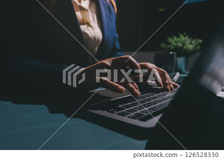 Expert woman asian female people review data number costing managerial account prepare monthly actual cost variance report at tax audit office. ESG sheet budget control ERP process service project. 126528330