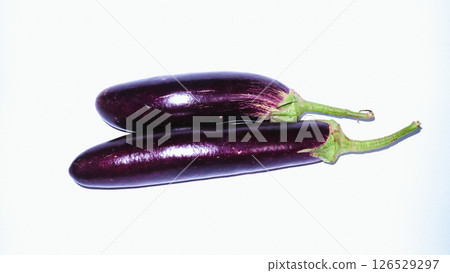 Fresh purple eggplant on a white background. Summer vegetable, healthy lifestyle concept  126529297