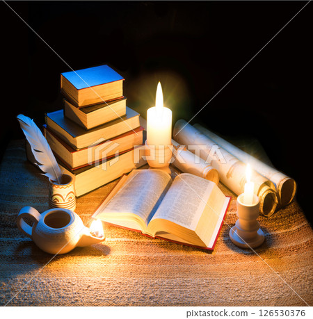 Vintage lamp illuminates old books 126530376