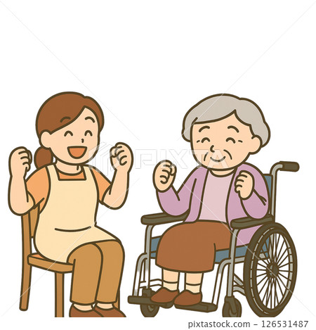 An elderly woman doing light exercises and her caregiver (helper) 126531487